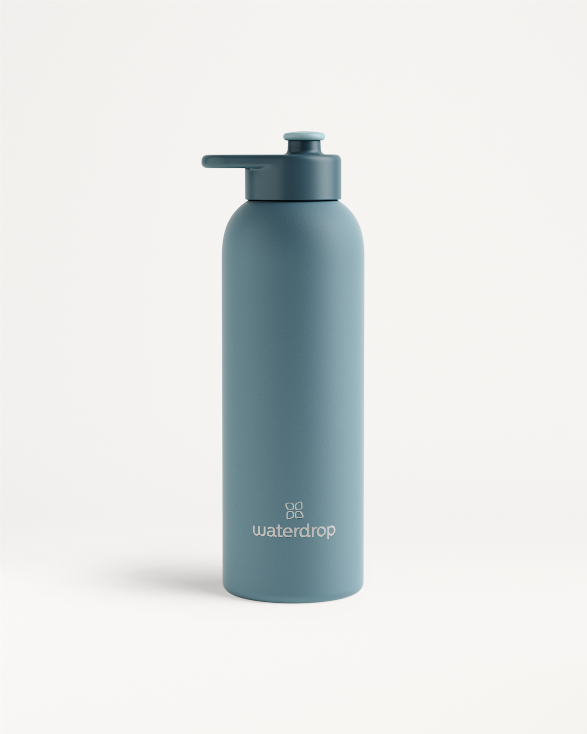Bouteille Thermo Inox · Bouchon sport, teal, powder-coated steel bottle.