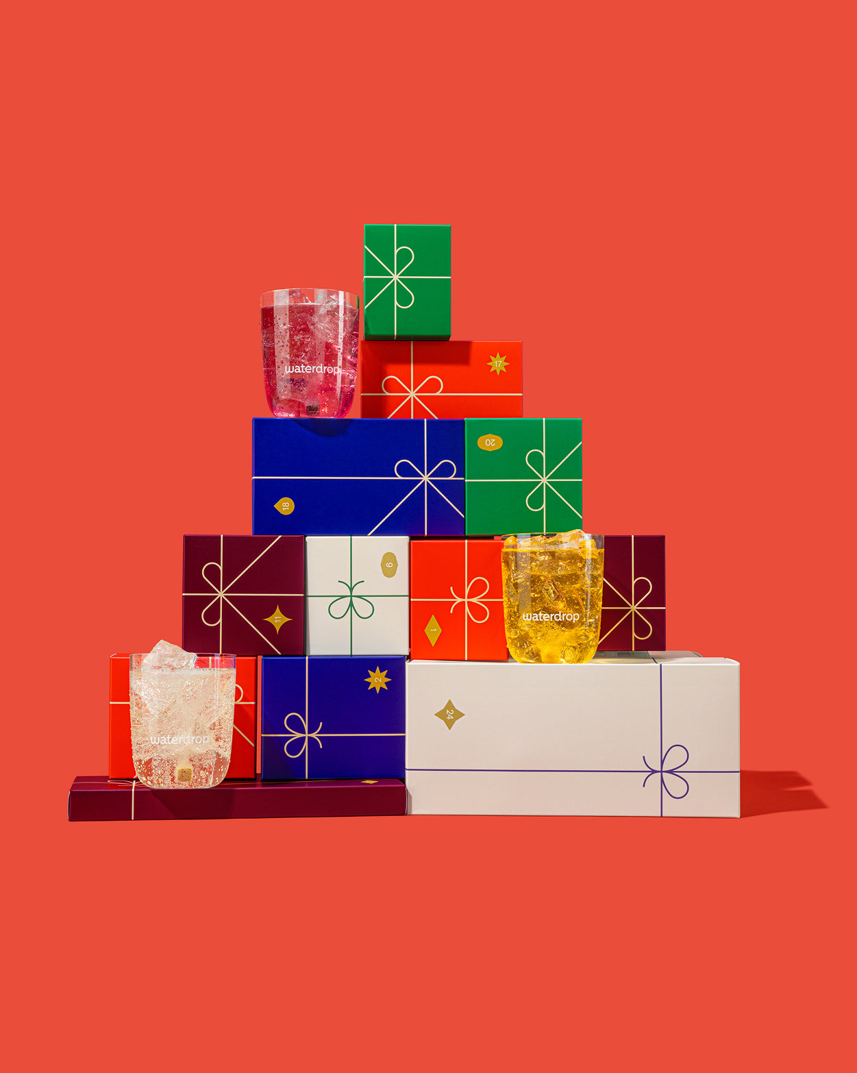 Grand Calendrier de l'avent with waterdrop® tumblers and gift boxes.