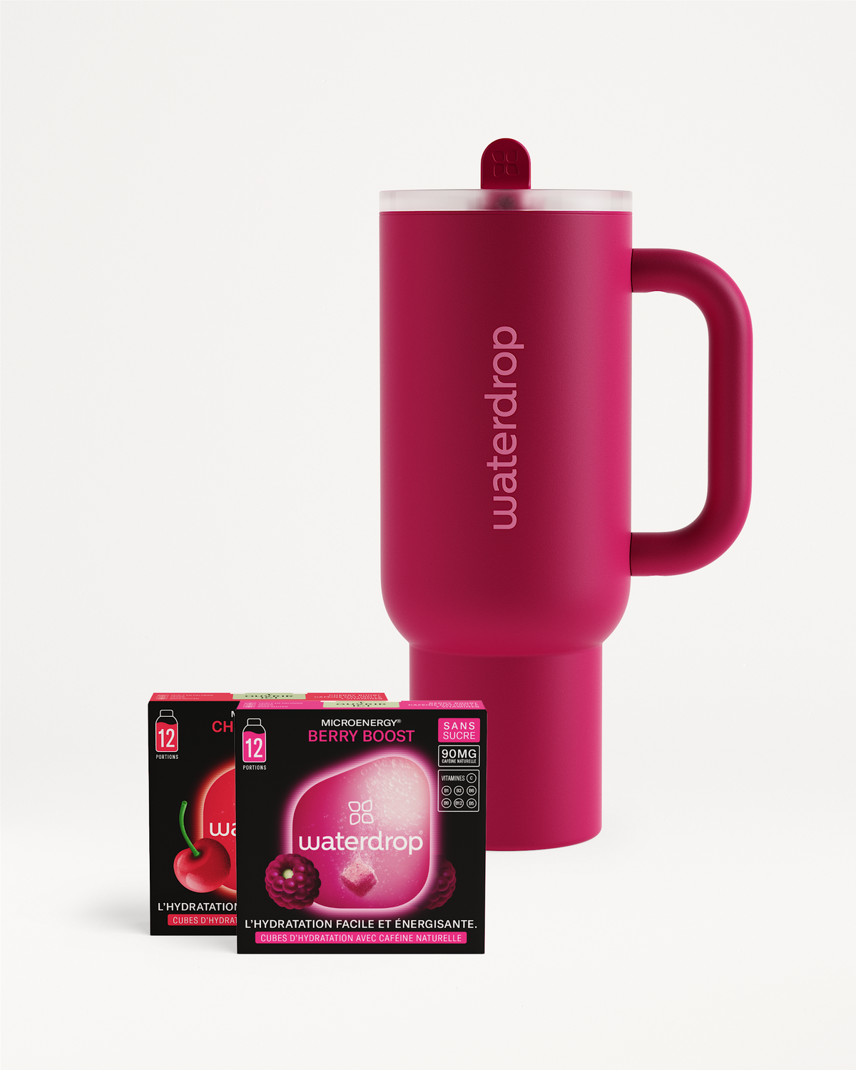 Coffret Mode Dynamique: Pink travel mug with Berry Boost cubes.