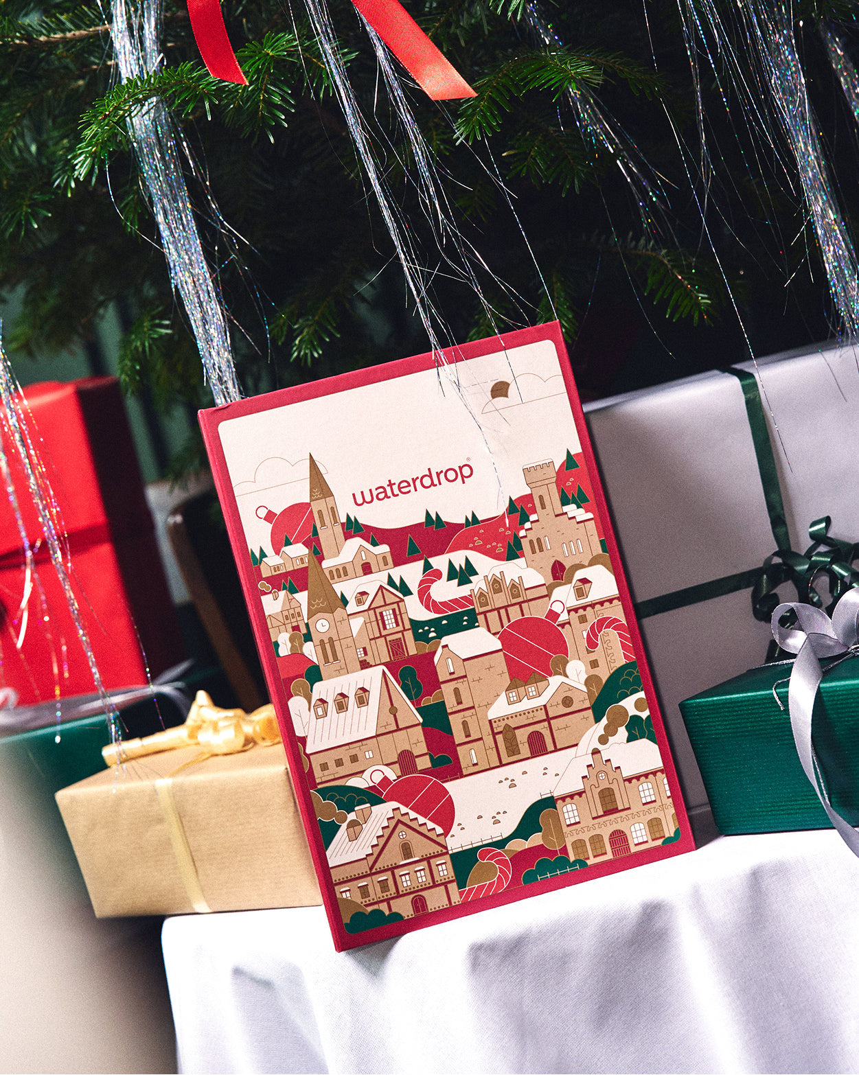 Festive Hydration Gift Set under Christmas tree.