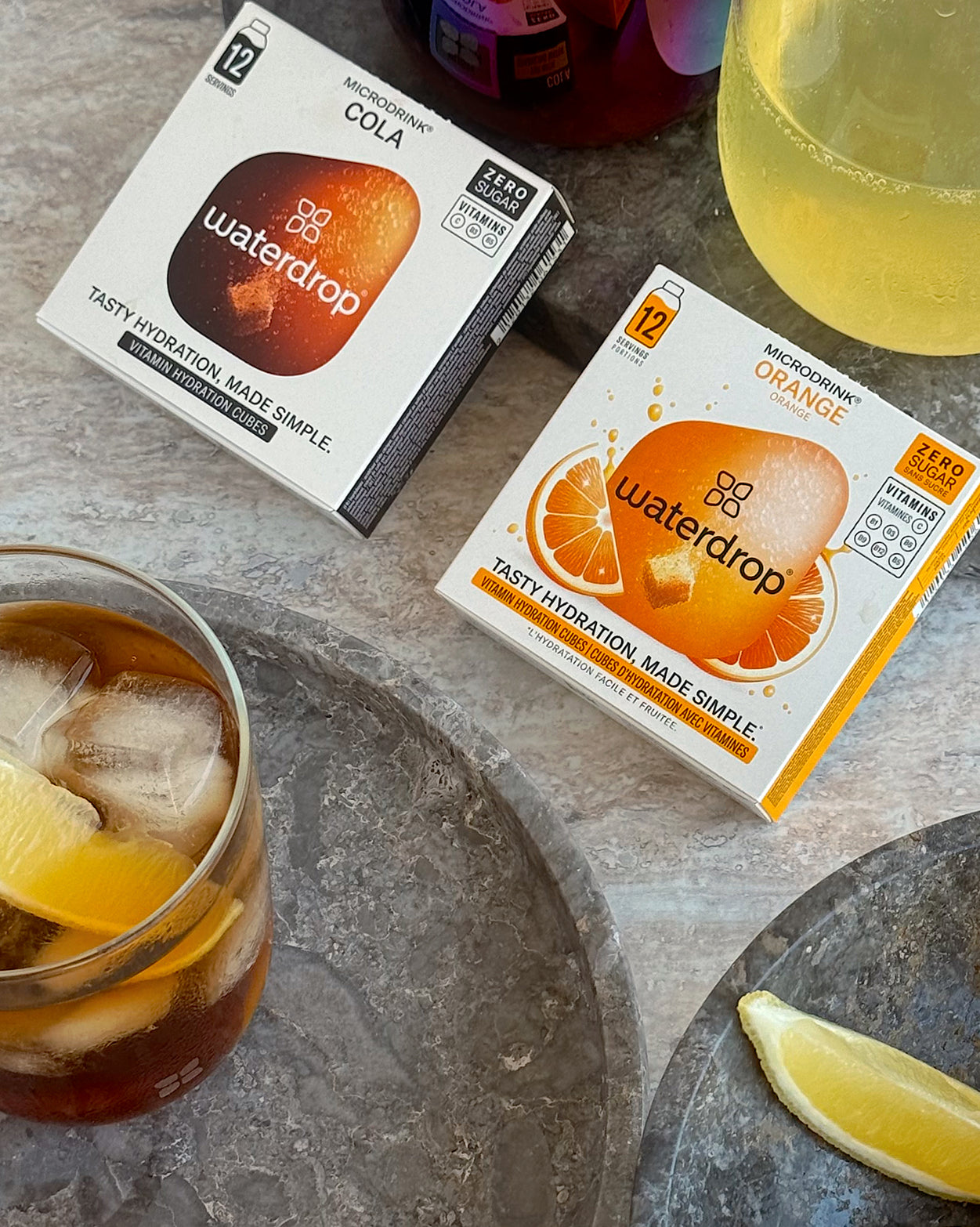 Coffret 3+1 Cola Orange hydration cubes with drinks.