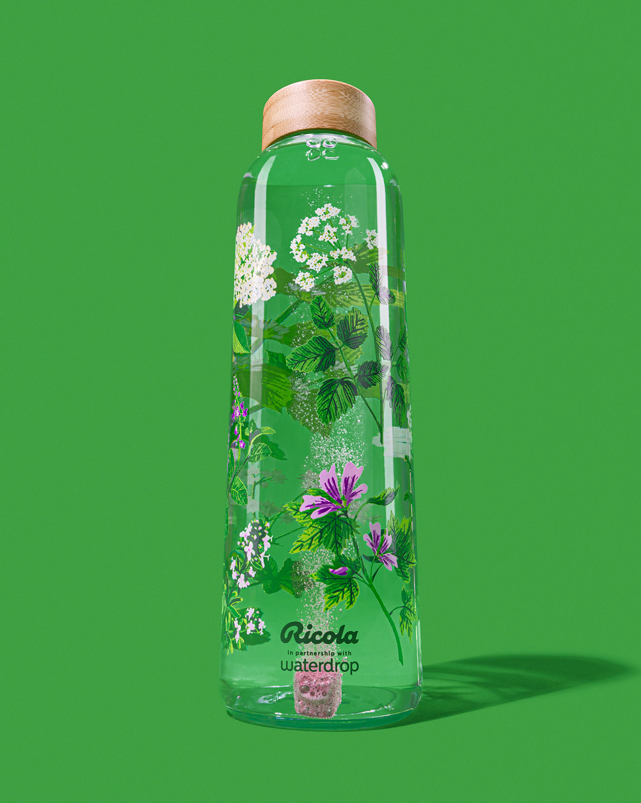 Ricola Edition Glass Bottle with herbal design.