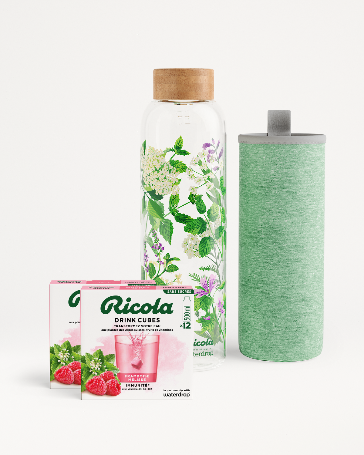 Coffret Bouteille Ricola with drink cubes and glass bottle.