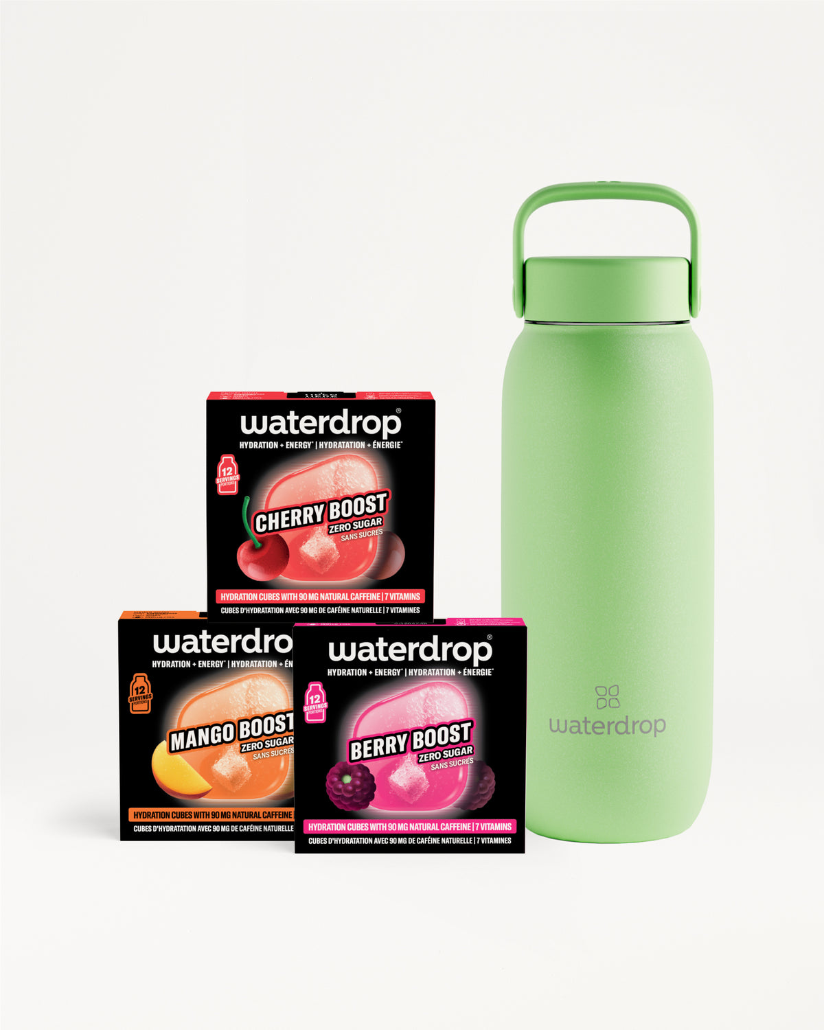 Bouteille verte isolante avec poignée à côté de trois boîtes Waterdrop aromes.