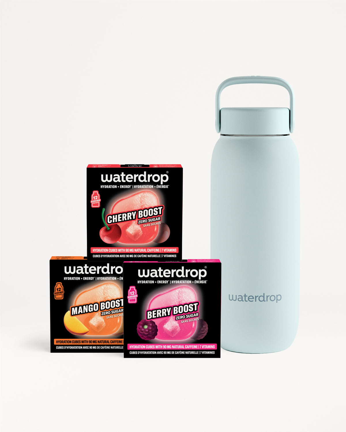 Trois boîtes de sachets flavor boost à côté d'une bouteille réutilisable bleu clair.