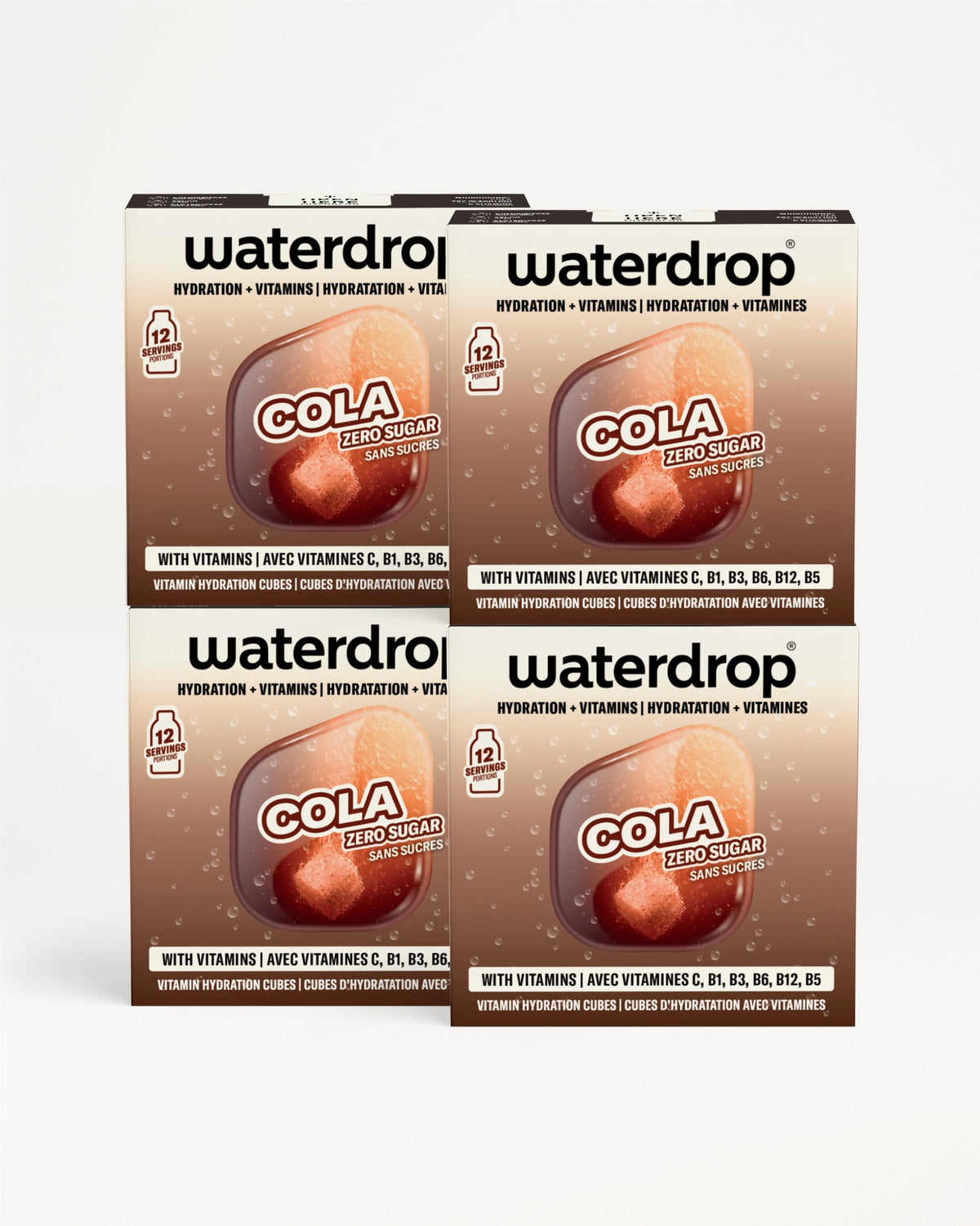 Quatre boîtes de poudre d'électrolyte au goût cola disposées en grille 2x2.