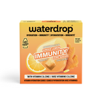 Emballage orange et jaune de cubes d’immunité Waterdrop avec graphique d’agrumes.