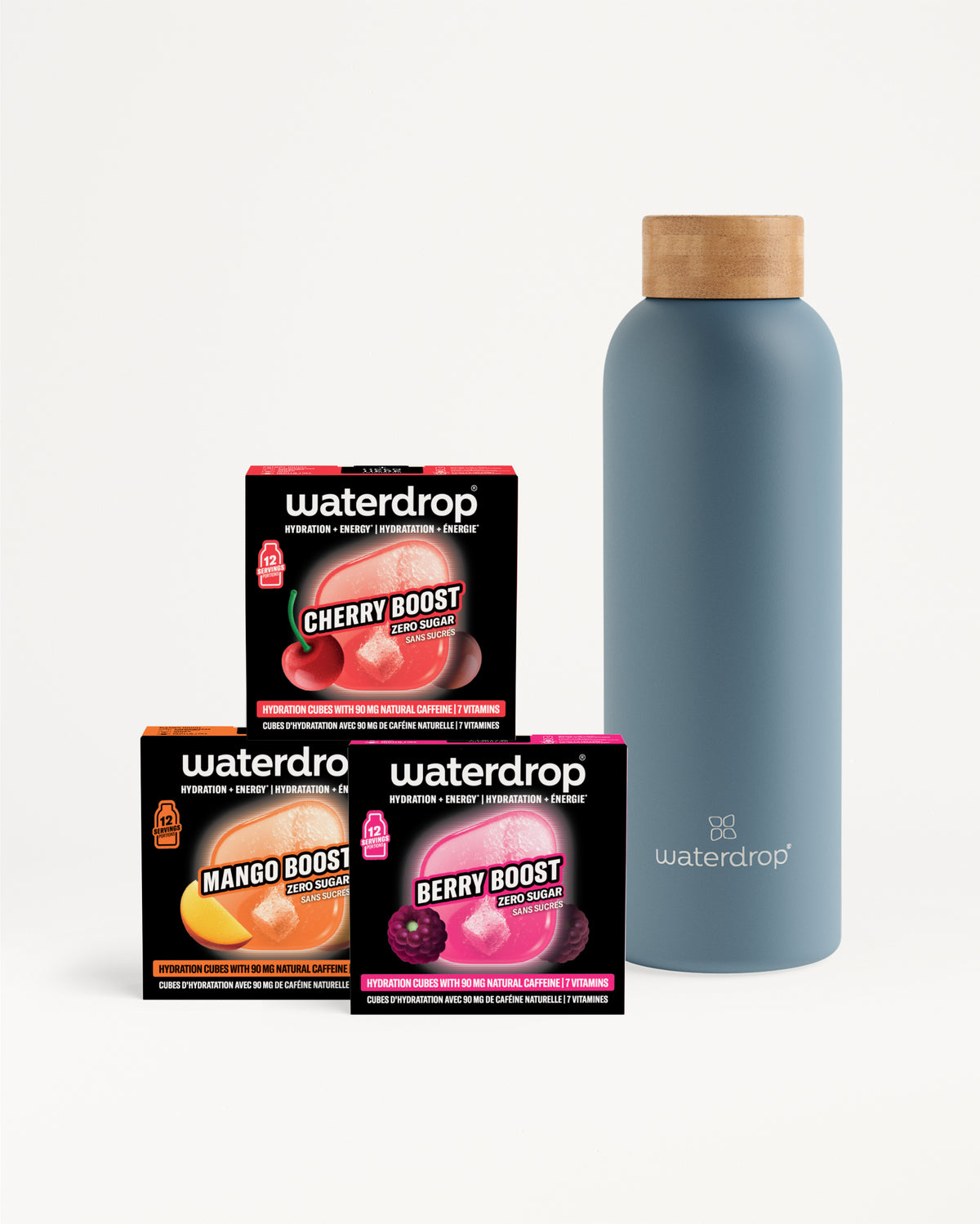Ensemble de trois boîtes Waterdrop de saveurs avec une grande bouteille bleue réutilisable et bouchon en bois.