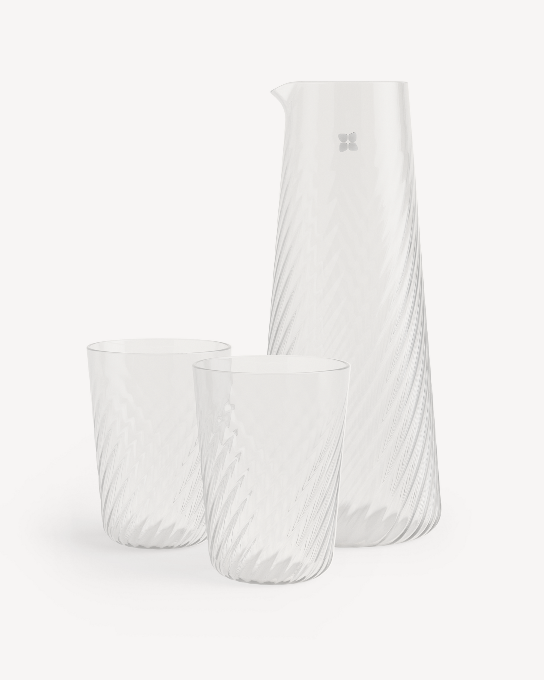 Coffret Carafe striée with spiral-patterned carafe and glasses.