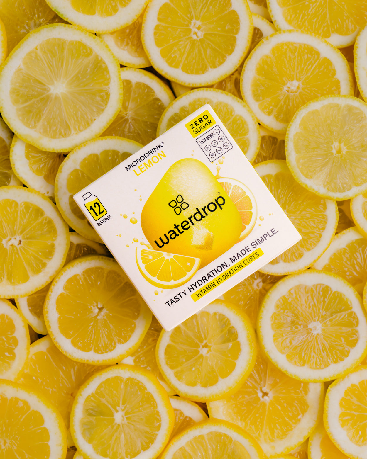 CITRON 3+1: lemon hydration cubes box on lemon slices.