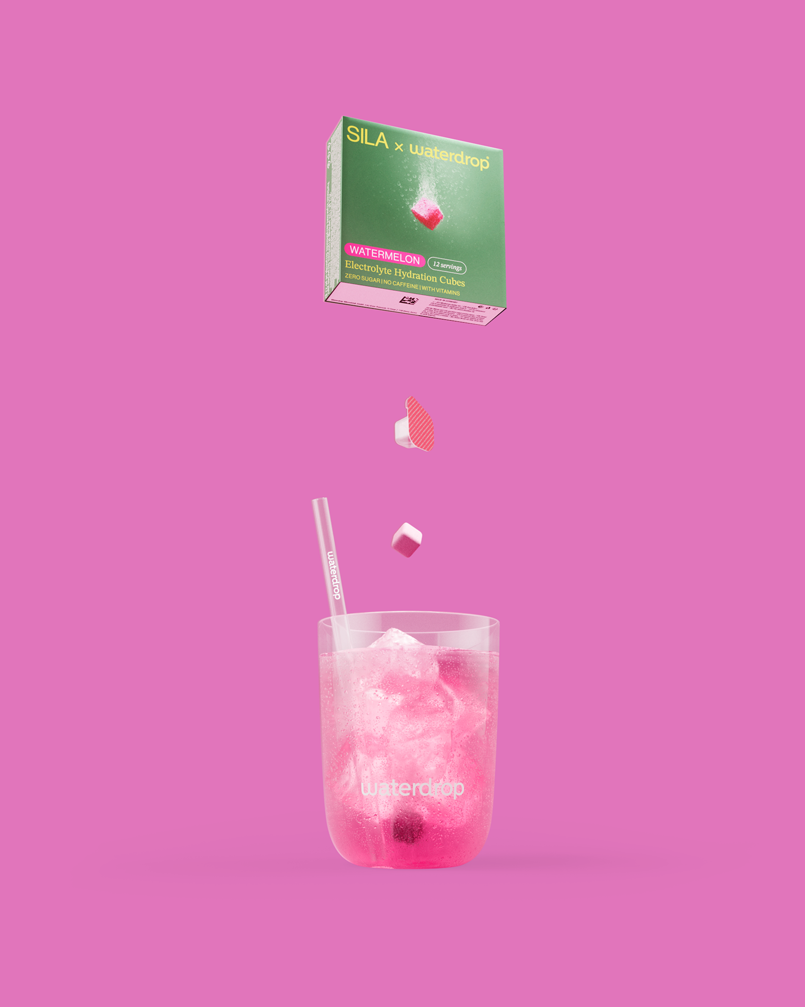 SILA Pastèque Electrolyte Hydration Cubes above fizzy drink glass.